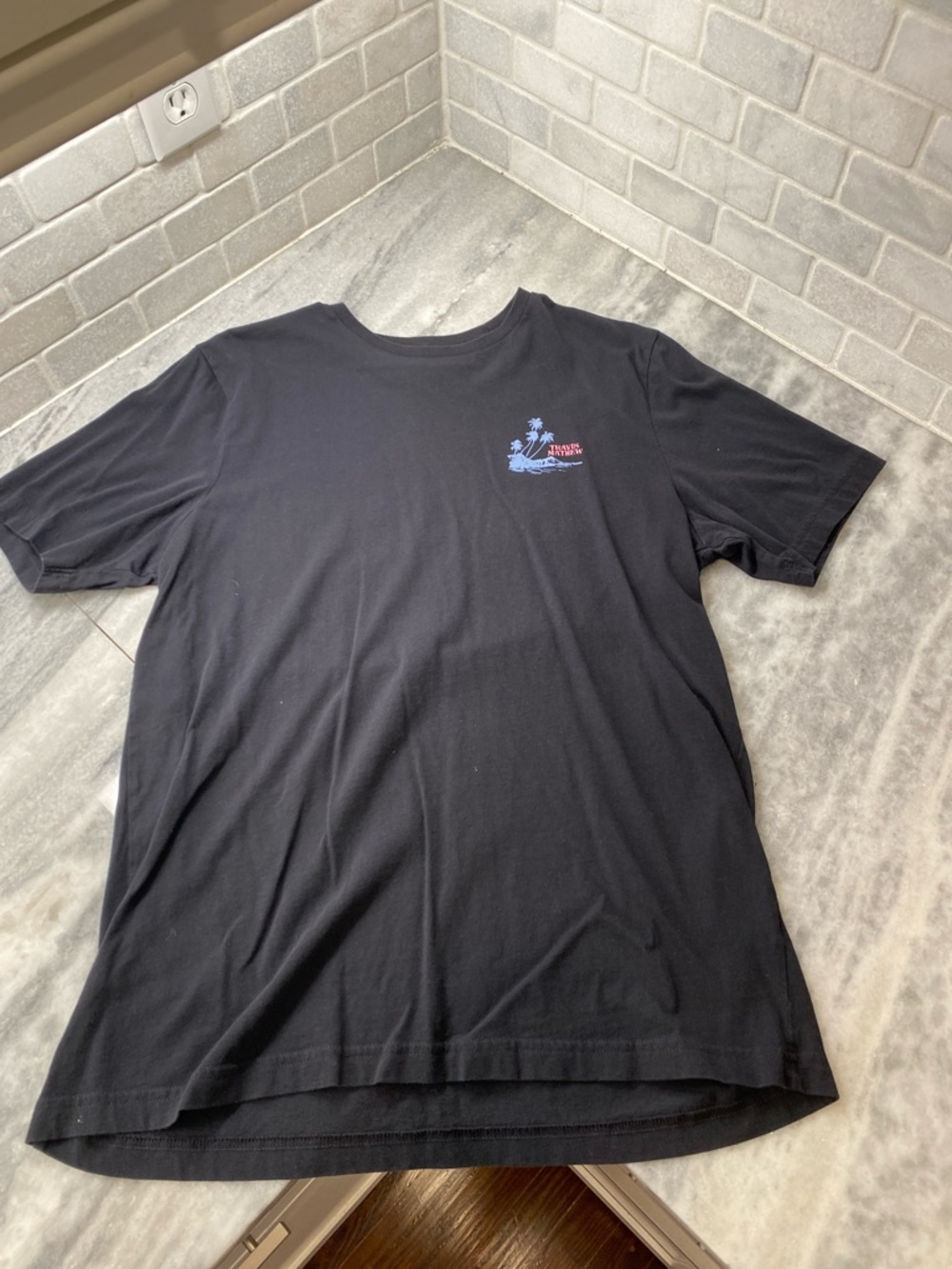 Travis Mathew Black Short-Sleeve Crew with Small Blue & Red Logo